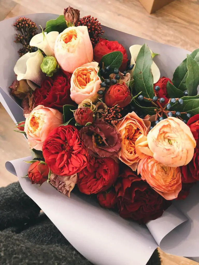 redfin valentine's day article. bouquet of pink and red flowers and roses.