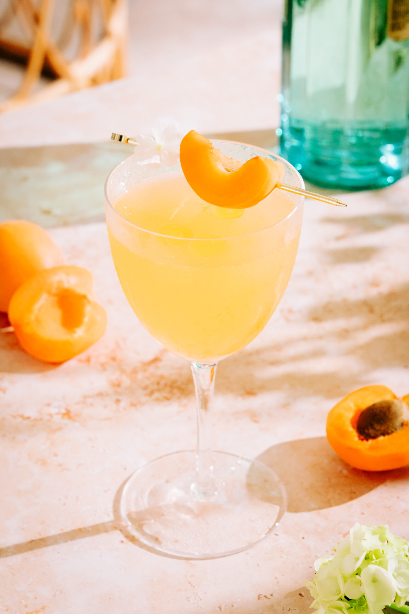 Apricot Gin Cocktail garnished with an apricot