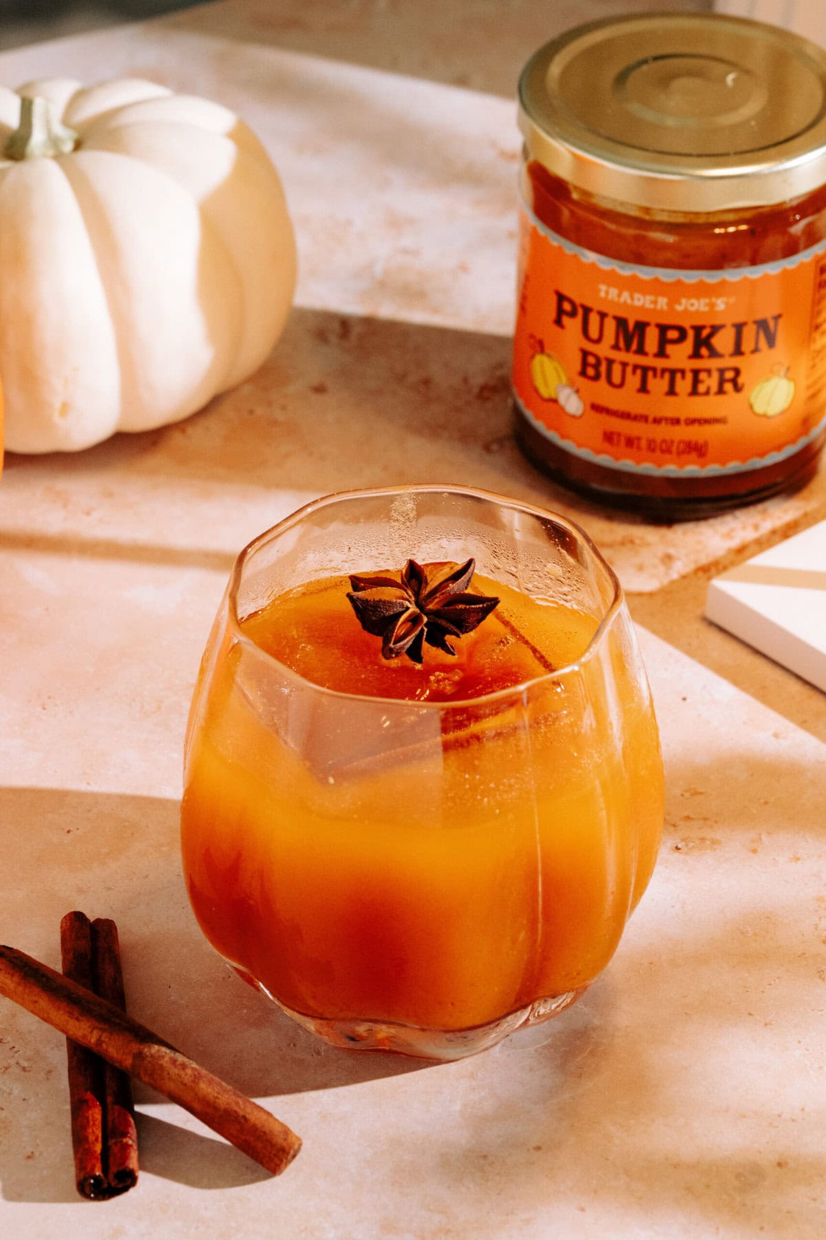 Pumpkin Butter Whiskey Smash cocktail with pumpkin and pumpkin butter