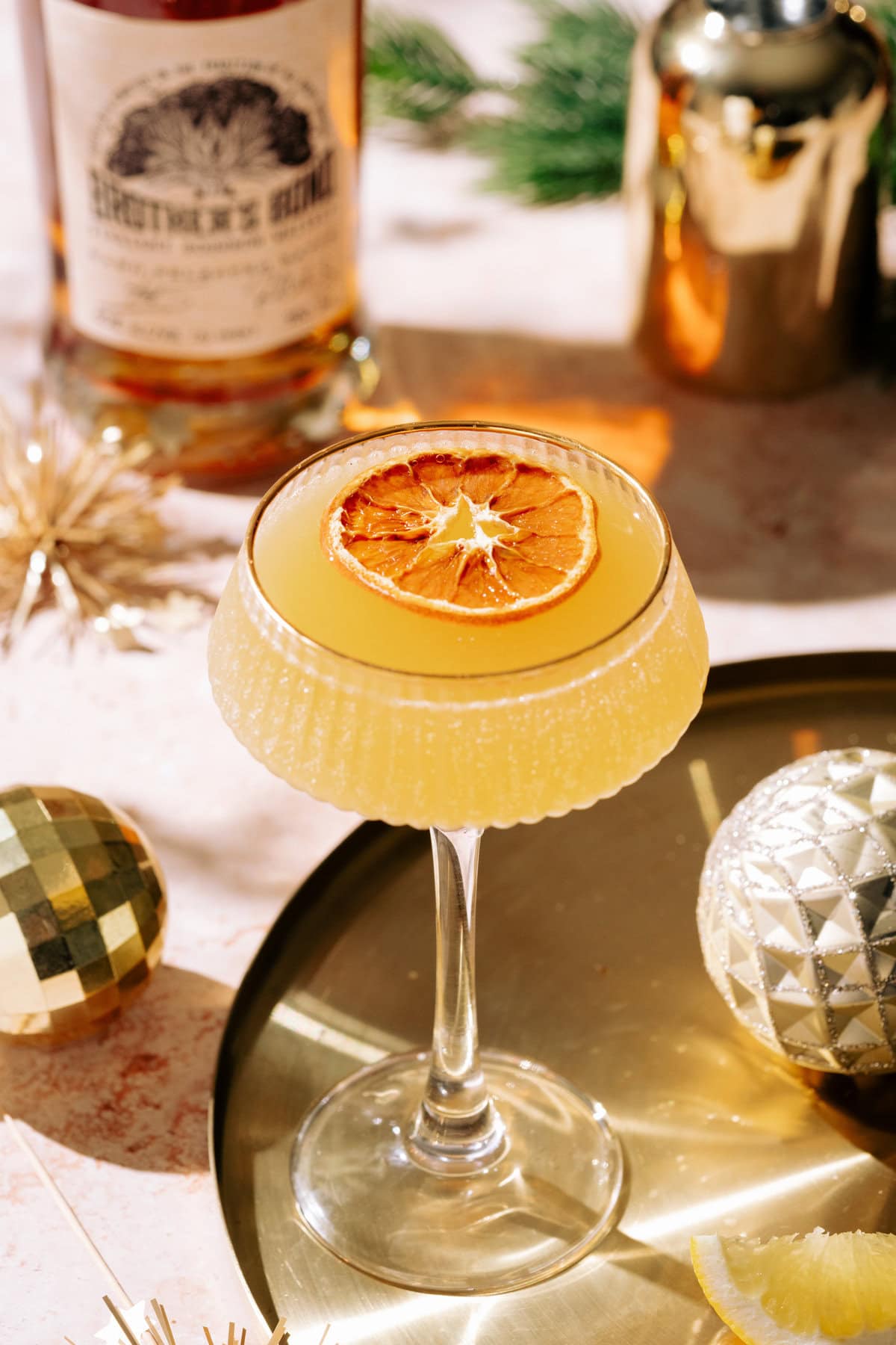 Glittering Gold Rush (Bourbon Champagne Cocktail) - The Social Sipper